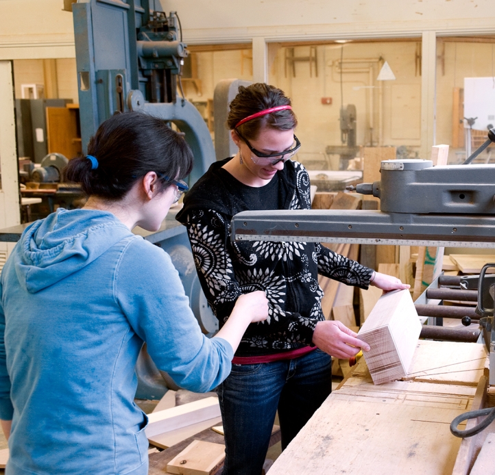 Student and faculty member in woodworking class